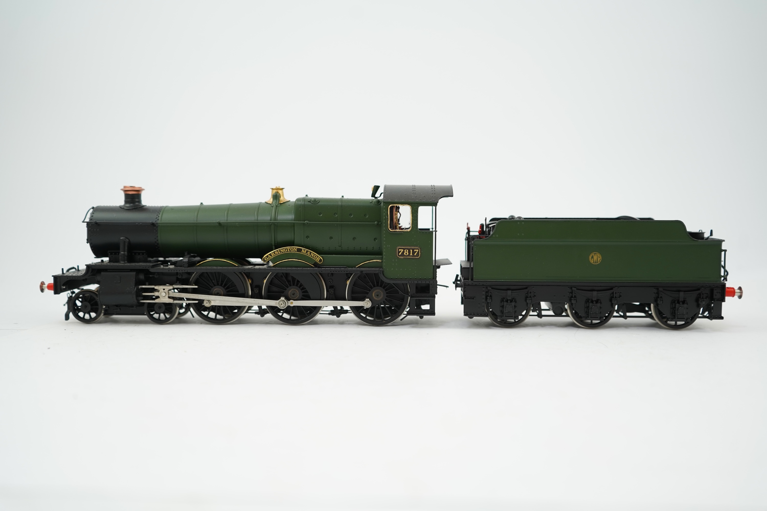 An 0 Gauge model of GWR Manor Class, Garsington Manor 7817, 4-6-0 tender locomotive, powered for two rail operation.